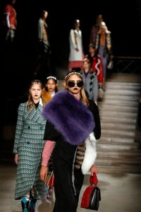 Models wear creations for Miu Miu's Spring-Summer 2016 ready-to-wear fashion collection presented during the Paris Fashion Week, Wednesday, Oct. 7, 2015 in Paris, France. (AP Photo/Francois Mori)