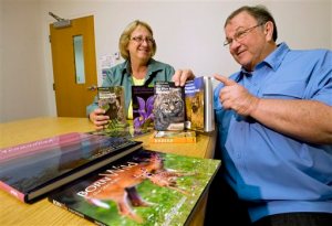 ADVANCE FOR SUNDAY OCT. 5 AND THEREAFTER -  This Tuesday Sept. 15, 2015 photo shows Ann and Rob Simpson of Stephens City, both professors at Lord Fairfax Community College, in Middletown, Va.  The two have been recognized by the Outdoor Writers Association of America as award recipients during the 2015 OWAA Excellence in Craft Contest. The couple, who have travelled worldwide, have produced multiple books including several national parks.  (Rich Cooley/Northern Virginia Daily via AP)