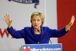 FILE - In a Tuesday, Sept. 22, 2015 file photo, Democratic presidential candidate Hillary Rodham Clinton speaks during a community forum on healthcare, at Moulton Elementary School in Des Moines, Iowa. Hillary Rodham Clinton on Sunday, Sept. 27 again defended her use of a private email server while she was secretary of state, comparing the multiple investigations to Republican-led probes into her husbands administration more than two decades ago. (AP Photo/Charlie Neibergall, File)