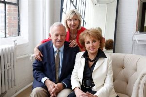 In this image released by ABC,  John and Jan Ramsey pose with Barbara Walters, right, for her "American Scandal" series for Discovery. Walters is revisiting some of her biggest news stories for "American Scandals," a new 9-episode series that premieres on Investigation Discovery on Monday at 10 p.m. EST. (Heidi Gutman/ABC via AP)