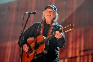 FILE - In this Sept. 19, 2015 file photo, Willie Nelson performs at Farm Aid 30 in Chicago. Nelson has rescheduled two shows and canceled another due to an unspecified health issue. Nelson and Merle Haggard were scheduled to perform on Thursday, Oct. 15, and Friday, but the South Carolina and Virginia dates were rescheduled and a show in Reading, Pennsylvania on Saturday was canceled. (Photo by Rob Grabowski/Invision/AP, File)