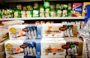 Food products manufactured in a Jewish settlement in the West Bank are on display at a supermarket in Tel Aviv, Wednesday, Nov. 11, 2015. Relations between the European Union and Israel took a dive Wednesday after Jerusalem derided a decision of the 28-nation bloc to specially label products made in West Bank settlements. (AP Photo/Dan Balilty)