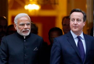 Prime Minister of India Narendra Modi, left, and British Prime Minister David Cameron leave No. 10 Downing Street in London, Thursday, Nov. 12, 2015. Modi is on a three day visit to  Britain. (AP Photo/Frank Augstein)
