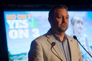 Ian James, executive director of ResponsibleOhio, a pro-marijuana legalization group, speaks to the crowd at an election night event at the Le Meridien hotel, Tuesday, Nov. 3, 2015, in Columbus, Ohio. Voters have rejected a ballot measure that would have made Ohio the first state to make marijuana legal for both recreational and medical use in a single stroke. (AP Photo/John Minchillo)