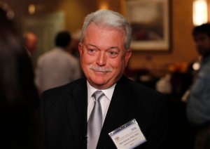 In this photo taken Sept. 20, 2010. AquaBounty CEO Ron Stotish, the company that applied with the Food and Drug Administration (FDA) to market genetically modified salmon, speaks to reporters in Rockville, Md. The FDA on Thursday approved genetically modified salmon, the first such altered animal allowed for human consumption in the United States. AquAdvantage Salmon was created Massachusetts-based AquaBounty. Stotish said in a statement that the fish is a game changer that brings healthy and nutritious food to consumers in an environmentally responsible manner without damaging the ocean and other marine habitats. (AP Photo/Charles Dharapak)