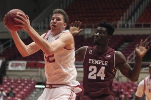 Temple center Ernest Aflakpui (24) pressures Utah forward Jakob Poeltl during the Puerto Rico Tip-Off college basketball tournament in San Juan, Sunday, Nov. 22, 2015. (AP Photo/Ricardo Arduengo)