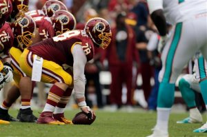 ADVANCE FOR SUNDAY, NOV. 1 AND THEREAFTER - In this photo taken Sept. 13, 2015, the Washington Redskins offensive line is seen during the first half of an NFL football game against the Miami Dolphins in Landover, Md. In their actions and their words at the outset of this season, new general manager and second-year head coach Jay Gruden made quite clear that they wanted the Washington Redskins to be a run-first team. And they did, indeed, begin things that way, becoming the first NFL club in nearly a decade to have a pair of guys each rush for 100 yards in Weeks 1 and 2. (AP Photo/Mark Tenally)