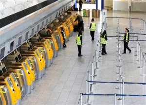 Lufthansa counters are almost empty as flight attendants of Lufthansa airline went on strike for the fifth day at the airport in Frankfurt, Germany, Wednesday, Nov. 11, 2015. (AP Photo/Michael Probst)