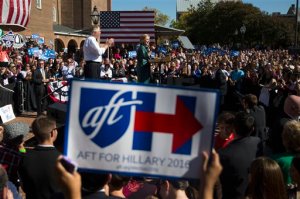 Democratic presidential candidate, former Secretary of State Hillary Rodham Clinton, accompanied by Virginia Gov. Terry McAuliffe, speaks during a campaign rally, Friday, Oct. 23, 2015, in Alexandria, Va. (AP Photo/Evan Vucci)