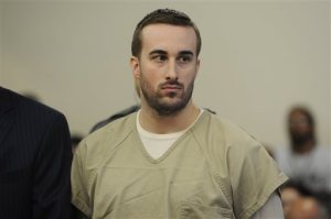 Kyle Navin, right, seen with his attorney Eugene Riccio, is arraigned in Bridgeport Superior Court, in Bridgeport, Conn. Tuesday, Nov. 3, 2015. Navin was charged with two counts of murder in the deaths of his parents, Jeanette and Jeffrey Navin, who planned to cut him out of their will. Jeanette and Jeffrey Navin of Easton went missing in August. Their remains were found Oct. 29 outside a vacant house in neighboring Weston. (Ned Gerard/Hearst Connecticut Media via AP, Pool) MANDATORY CREDIT