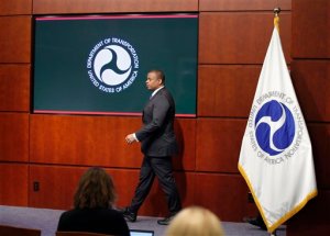 Transportation Secretary Anthony Foxx arrives for a news conference about Takata air bags, Tuesday, Nov. 3, 2015, at the Transportation Department in Washington. U.S. auto safety regulators fined Takata Corp. of Japan $70 million for lapses in the way it handled recalls of millions of explosion-prone air bags that are responsible for eight deaths and more than 100 injuries worldwide. (AP Photo/Alex Brandon)