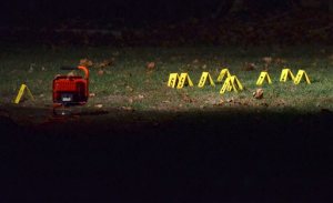 In this Monday, Nov. 16, 2015 photo, evidence cards sit in the yard of a house near the Baitul Aman mosque in South Meriden, Conn., where police and the FBI were investigating reports of multiple gunshots fired at the mosque. The mosque was empty at the time of the incident and there were no injuries. The Council on American-Islamic Relations, the largest Muslim civil rights and advocacy group in the country, reports a spike in anti-Muslim acts in the U.S., since the attacks in Paris. (Bryan Lipiner/Record-Journal via AP) MANDATORY CREDIT
