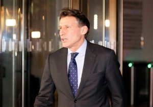 IAAF President Sebastian Coe walks out to give a statement to journalists outside his office in London, Friday, Nov. 13, 2015. Russia's track and field federation was provisionally suspended Friday by the sport's governing body. (AP Photo/Frank Augstein)