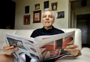 In this Nov. 17, 2015, photo, Sal Natale looks over a Medicare brochure at his home in Seminole, Fla. Rising drug costs are starting to hit Medicare's popular prescription drug program, with many senior citizens looking at double digit premium increases next year. Natale, a retired dentist, said prescription premiums for him and his wife are going up about 30 percent next year, and he doesnt see a good alternative. "Im just going to grin and bear and hope it starts moderating," Natale said. (AP Photo/Chris O'Meara)