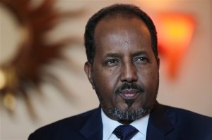 Somali President Hassan Sheikh Mohamud , talks to the Associated Press while visiting Dubai in the United Arab Emirates for a conference on African business opportunities in Dubai, United Arab Emirates, Tuesday, Nov. 17, 2015. Somalias president said Tuesday that al-Qaida and the Islamic State group are merely the same evil force that the world needs to confront in the wake of the attacks on Paris.  (AP Photo/Kamran Jebreili)
