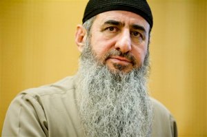 FILE - This is an Aug. 14, 2015  file photo  of Najmaddin Faraj Ahmad, known as Mullah Krekar, appearing in court in Oslo.  European law enforcement authorities said Thi=urday Nov. 12, 2015  they've broken up a Norway-based Iraqi Kurdish recruitment ring that sent fighters to Iraq and Syria. Officials have issued arrest warrants for 17 people in a half-dozen European countries and in the Mideast. Italian authorities said Thursday the ideological leader of the ring was Najmaddin Faraj Ahmad, known as Mullah Krekar, who was already in prison in Norway. (Olav Nesvold / NTB scanpix via AP) NORWAY OUT