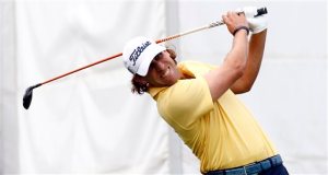 Lucas Glover watches he tee off on the first hole of the third round of the Sanderson Farms Championship golf tournament in Jackson, Miss., Sunday, Nov. 8, 2015. (AP Photo/Rogelio V. Solis)