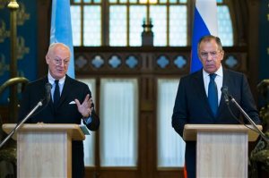 FILE - In this Wednesday, Nov. 4, 2015, file photo, Russian Foreign Minister Sergey Lavrov, right, listens as U.N. Special Envoy for Syria Staffan de Mistura speak during a news conference following their talks in Moscow. Russia has circulated a document, obtained by The Associated Press on Tuesday, Nov. 10, on ending the nearly five-year-old Syrian conflict that calls for drafting a new constitution in up to 18 months that would be put to a popular referendum and be followed by an early presidential election. (AP Photo/Alexander Zemlianichenko, File)