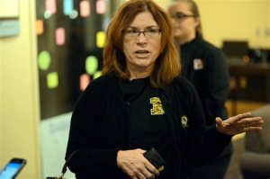 Garnett Stokes, Executive Vice Chancellor and Provost of the University of Missouri, talks with media in the basement of the student union building on the University of Missouri campus Tuesday night, Nov. 10, 2015, after anonymous threats were made towards black students through social media Tuesday in Columbia, Mo. Stokes was on campus alone to investigate what was going on to make a decision as to whether or not to cancel classes Wednesday. At about 1:50 a.m. Wednesday, Nov. 11, 2015, MU Police arrested Hunter Park, 19, on suspicion of making a terrorist threat on Yik Yak, according a department media release. Park is a student at Missouri University of Science and Technology. (Justin L. Stewart/Columbia Missourian via AP)