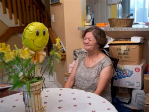 In this, Wednesday, Oct. 14, 2015 photo, Maria Ruiz, 62, is brought to tears as she speaks during an interview with The Associated Press at her home in Miami. Ruiz is one of a dozen Florida residents with disabilities that have filed a lawsuit in federal court alleging they have endured unreasonably long wait times, most more than two years, to go before a Social Security judge as they appeal their disability benefits. Miami has the longest wait time in the country, averaging 22 months, according to the federal agencys own website. (AP Photo/Wilfredo Lee)