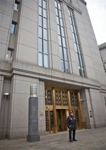 A court officer stands outside U.S. Federal Court, where two nephews of Venezuela's powerful first lady are facing arraignment after being arrested in Haiti, Thursday, Nov. 12, 2015, in New York. An indictment unsealed on Thursday accuses Efrain Campos and Francisco Flores of conspiring to smuggle cocaine into the United States. (AP Photo/Bebeto Matthews)