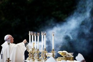 FILE - In this Wednesday, Sept. 23, 2015 file photo, Pope Francis conducts Mass outside the Basilica of the National Shrine of the Immaculate Conception, in Washington. Pope Francis follows his predecessors next week Nov. 25-30, 2015 to visit Africa whose growing numbers of Catholics are seen as a bulwark for a church seeking to broaden its appeal amid secularism, competing Christian faiths and violent extremism, in a trip that will take him to Kenya, Uganda and the Central African Republic. (AP Photo/David Goldman, File)