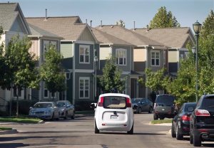 Google's self-driving car tours the Mueller Housing Development, Wednesday, Sept. 23, 2015, in Austin, Texas. Hustling to bring cars that drive themselves to a road near you, Google finds itself somewhere that has frustrated many before: Waiting for help from California's department of motor vehicles. (Ralph Barrera/Austin American-Statesman via AP) AUSTIN CHRONICLE OUT, COMMUNITY IMPACT OUT, INTERNET AND TV MUST CREDIT PHOTOGRAPHER AND STATESMAN.COM, MAGAZINES OUT; MANDATORY CREDIT