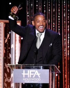 Will Smith accepts the Hollywood actor award for "Concussion," at the Hollywood Film Awards at the Beverly Hilton Hotel on Sunday, Nov. 1, 2015, in Beverly Hills, Calif. (Photo by Chris Pizzello/Invision/AP)