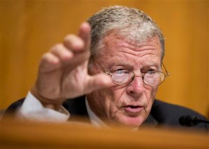 FILE - In this Sept. 29, 2015, file photo, Sen. James Inhofe, R-Okla., questions a witness during a hearing on Capitol Hill in Washington. Inhofe, an 81-year-old avid pilot who had quadruple heart bypass surgery two years ago, is trying to loosen medical exam requirements so that private pilots like him dont have to make so many doctors visits to show they are fit to fly.  (AP Photo/Manuel Balce Ceneta, File)