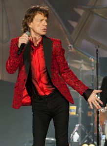 FILE - In this July 4, 2015 file photo, Mick Jagger of the Rolling Stones performs at the Indianapolis Motor Speedway in Indianapolis, Ind. Jagger paid tribute to the late Allen Toussaint, the New Orleans musician who wrote Southern Nights, Lady Marmalade and many other hits. He was such an influential songwriter and performer, Jagger tweeted Wednesday, Nov. 11. Early in their career, the Rolling Stones covered Toussaints Pain in My Heart and Fortune Teller, both written under the pseudonym Naomi Neville. (Photo by Barry Brecheisen/Invision/AP, File)