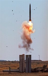 FILE - In this undated photo from files a S-300 air defense missile is launched in Ashuluk shooting range in southern Russia. The head of a Russian state-controlled industrial conglomerate says the contract for the delivery of S-300 air defense missile systems to Iran has been finalized. (AP Photo, File)