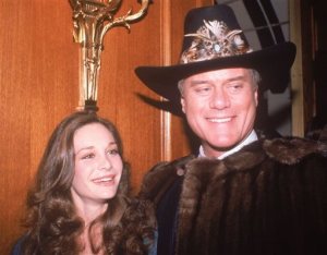 FILE - In this Nov. 21, 1980, file photo, actress Mary Crosby, daughter of late entertainer Bing Crosby, and actor Larry Hagman, who plays J.R. Ewing in the popular TV series "Dallas," appear at a party in Los Angeles. Crosby starred as Kristin Shepard, the sister of Sue Ellen, and the woman who shot J.R. As many as 90 million viewers in the U.S. alone tuned to "Dallas," Nov. 21, 1980, to find out who shot J.R. Ewing. (AP Photo/Rasmussen, File)