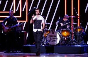 Thomas Rhett performs a Florida Georgia Line song at the 2015 CMT Artist of the Year Show at Schermerhorn Symphony Center Wednesday, Dec. 2, 2015, in Nashville, Tenn. (Photo by Donn Jones/Invision/AP)