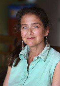 In this Nov 27, 2015 photo, U.S. activist Lori Berenson, poses for a portrait in her home in Lima, Peru. Berenson is heading home to New York,  two decades after being found guilty of aiding leftist rebels. The 46-year-old has been living quietly in Lima with her 6-year-old son since her 2010 parole. Shes been barred from leaving the country until her 20-year sentence lapsed. (AP Photo/Martin Mejia)