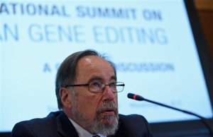 In this photo taken Dec. 1,2015, Nobel laureate David Baltimore of CalTech speaks to reporters at the National Academy of Sciences international summit on the safety and ethics of human gene editing, in Washington. Organizers of an international summit say a tool to edit human genes is nowhere near ready to attempt in pregnancy but they're calling for more laboratory research with the revolutionary technology. Editing the human genetic code promises to lead to long sought rules for intractable diseases. But it also could be used to alter human heredity, passing genetic alterations to future generations. (AP Photo/Susan Walsh)