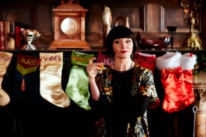 This photo provided by Acorn TV shows, Essie Davis as Phryne Fisher in the episode Murder Under the Mistletoe" of series 2 Miss Fishers Murder Mysteries," on Acorn TV. A monthly subscription to a streaming site is the gift that keeps on giving. (Acorn TV via AP)