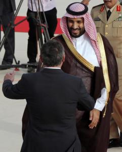 Jordan's King Abdullah II, front, welcomes Saudi Arabia's Defense Minister and Deputy Crown Prince Mohammed bin Salman upon his arrival at the Royal Palace in Amman, Jordan, Tuesday, Aug. 4, 2015. (Muhammad Hamed/Pool Photo via AP)