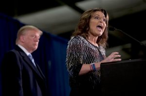 Former Alaska Gov. Sarah Palin, right, endorses  Republican presidential candidate Donald Trump during a rally at the Iowa State University, Tuesday, Jan. 19, 2016, in Ames, Iowa. (AP Photo/Mary Altaffer)