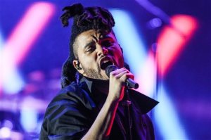 the 2015 We Can Survive Concert in Los Angeles. The Weeknds smash hit "Earned It" from the film, "Fifty Shades of Grey," was nominated for an Oscar for best original song, Thursday, Jan. 14, 2016. (Photo by Rich Fury/Invision/AP, File)