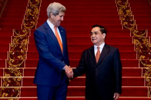 U.S. Secretary of State John Kerry, left, shakes hands with Lao Prime Minister Thongsing Thammavong after their meeting at the Prime Minister's Office in Vientiane, Laos, Monday, Jan. 25, 2016. Kerry is in Laos on the third leg of his latest round-the-world diplomatic mission, which will also take him to Cambodia and China. (AP Photo/Jacquelyn Martin, Pool)