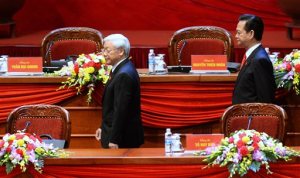 Vietnam Communist Party General Secretary Nguyen Phu Trong, left, and Prime Minister Nguyen Tan Dung walk on the podium the opening ceremony of the Communist Party of Vietnam's 12th Congress in Hanoi, Vietnam Thursday, Jan. 21, 2016. Vietnam's ruling Communist Party Thursday opened an eight-day congress to name the country's new set of leaders, who will determine the pace of critical economic reforms, the fight against corruption and relations with key trading allies, China and the United States. (Hoang Dinh Nam/Pool Photo via AP)