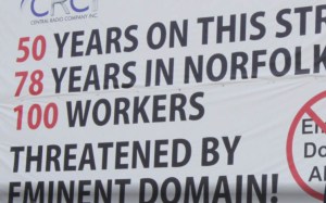 Central Radio placed a large protest banner on the side of the very building the government was trying to take in May 2012. The banner read: “50 years on this street/78 years in Norfolk/100 workers/Threatened by eminent domain!” The city of Norfolk immediately ordered Central Radio to remove the protest banner because it violated the city’s sign code.