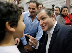 Republican presidential candidate, Sen. Ted Cruz, R-Texas, right, talks with Lucas Marmolejos, 7, left, after speaking at a rally, Wednesday, Feb. 24, 2016, in Houston. (AP Photo/David J. Phillip)