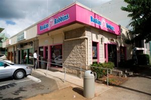 FILE - This 2008 file photo shows the Baskin-Robbins shop in Honolulu where President Barack Obama once worked.  Obama says his unglamorous first job scooping ice cream as a teenager taught him valuable lessons about responsibility and hard work.  (AP Photo/Marco Garcia)
