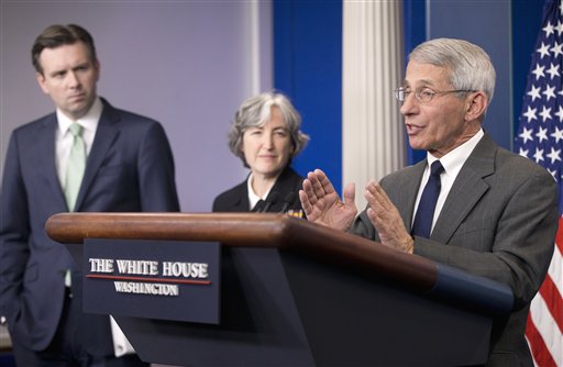 White House Press secretary Josh Earnest, left, and Dr. Anne Schuchat, center, Principal Deputy Director of the CDC, listen as Dr. Anthony Fauci, director of NIH/NIAID, answer questions from members of the media during the daily briefing in the Brady Press Briefing Room of the White House in Washington, Monday, Feb. 8, 2016. President Barack Obama is asking Congress for more than $1.8 billion in emergency funding to help fight the Zika virus. The money would be used to expand mosquito control programs, speed development of a vaccine, develop diagnostic tests and improve support for low-income pregnant women. (AP Photo/Pablo Martinez Monsivais)