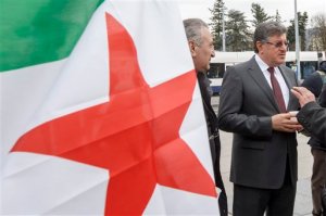 Syria's High Negotiations Committee, HNC, spokesman Salem al-Mislet, right, speaks to the media during a press briefing during Syria peace talks at the European headquarters of the United Nations, in Geneva, Switzerland, Tuesday, Feb. 2, 2016. (Salvatore Di Nolfi/Keystone via AP)