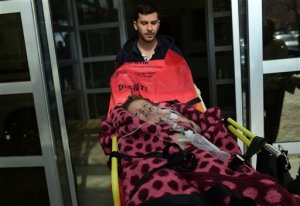 Turkish medics carry a wounded Syrian child to a hospital in Kilis, Turkey, Tuesday, Feb. 16, 2016. Airstrikes blamed on Russia hit at least two hospitals and a school in northern Syria on Monday, killing and wounding dozens of civilians and further dimming hopes for a temporary truce, as government troops backed by Russian warplanes pressed a major offensive north of Aleppo. The raids came days after Russia and other world powers agreed to bring about a pause in fighting that would allow for the delivery of humanitarian aid and the revival of peace talks.(AP Photo/Halit Onur Sandal)
