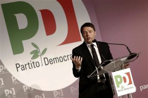 Italian premier Matteo Renzi delivers a speech during the national meeting of the Democratic Party in Rome, Italy,  Feb. 21, 2016. Renzi has has told his squabbling democrats that the government might consider resorting to a confidence vote to hasten approval of the law that will allow civil unions, but not marriage, for gay couples. (Giuseppe Lami/ANSA via AP)