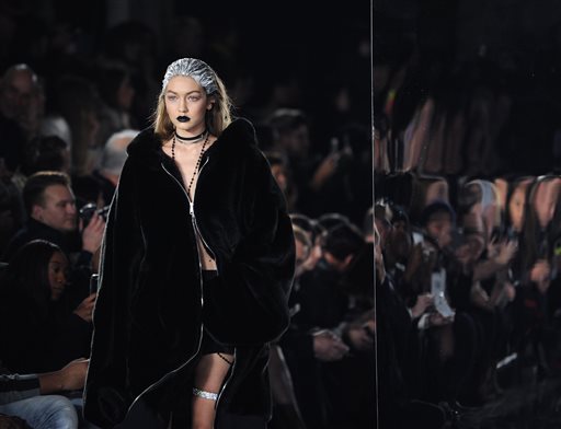 Gigi Hadid walks in the FENTY PUMA by Rihanna show during New York Fashion Week, Friday, Feb. 12, 2016.  (AP Photo/Diane Bondareff)