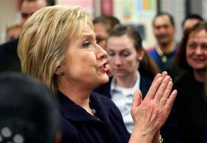 Democratic presidential candidate Hillary Clinton meets with employees of Paris Las Vegas during a visit to the hotel and casino Thursday, Feb. 18, 2016, in Las Vegas. (AP Photo/John Locher)